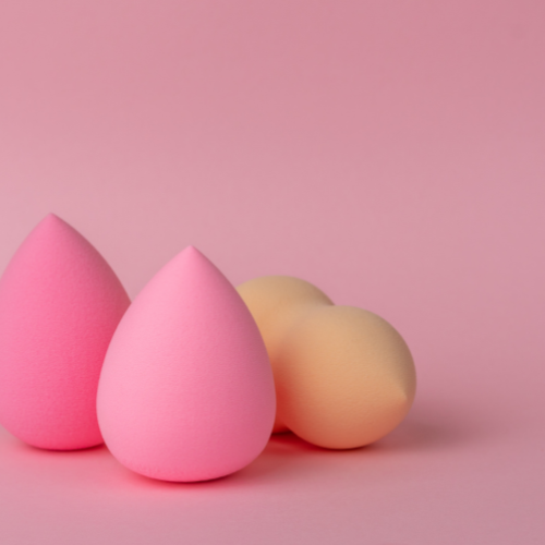 Makeup sponge blending foundation for a smooth, natural finish